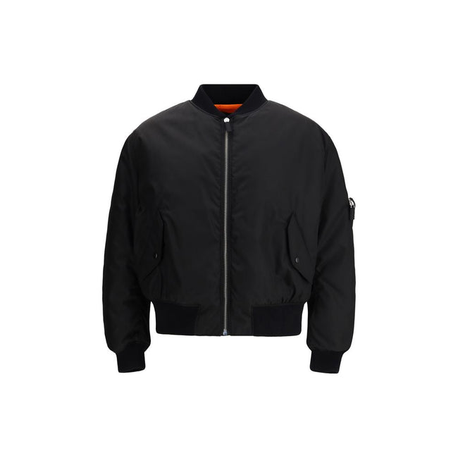 Black Polyamide BomberThe Prada Re-Nylon Bomber redefines a timeless silhouette with the house’s innovative sustainable fabric. Featuring a front zip closure, long sleeves with a classic utility-style zip pocket, and two side flap pockets, it combines fun