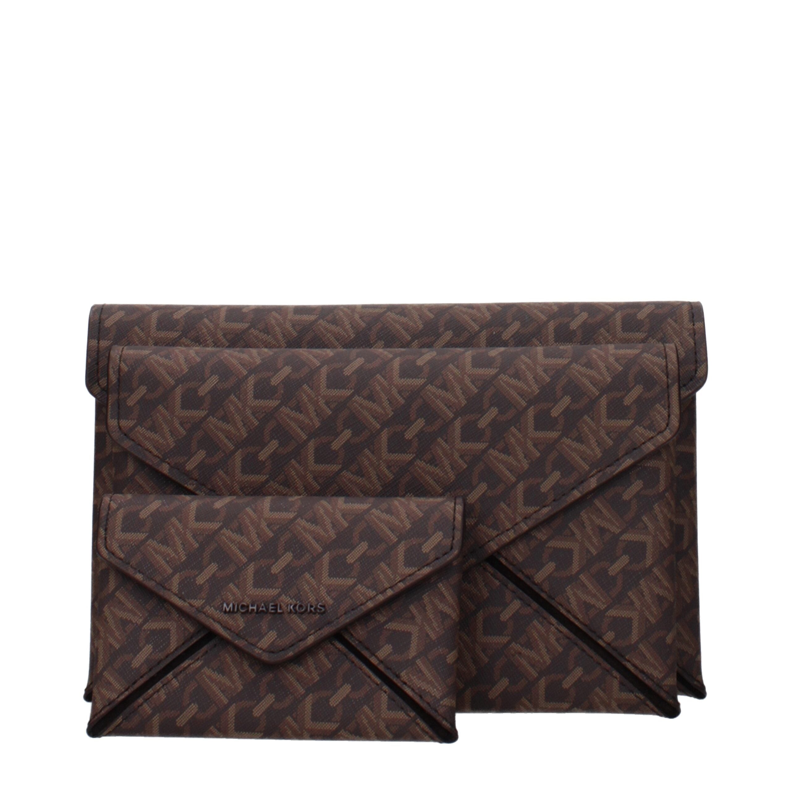 Brown Fabric Clutch BagDescription: The product with MPN 32F4T9JD7BBROWN and code F85040 fabric in brown is a clutches designed by Michael Kors. It has features like logo, 2 inner clutch removable.Brown Fabric Clutch Bag${tagsMichael KorsAulae Brown Fabri