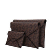Brown Fabric Clutch BagDescription: The product with MPN 32F4T9JD7BBROWN and code F85040 fabric in brown is a clutches designed by Michael Kors. It has features like logo, 2 inner clutch removable.Brown Fabric Clutch Bag${tagsMichael KorsAulae Brown Fabri