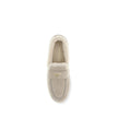 Beige Leather Slip-On LoafersSuede and sheepskin Loafers by Prada combine elegance and comfort in a modern, streamlined silhouette. The upper is embellished with a leather horsebit and a pinch-stitched basin, hallmarks of painstaking craftsmanship. The sh