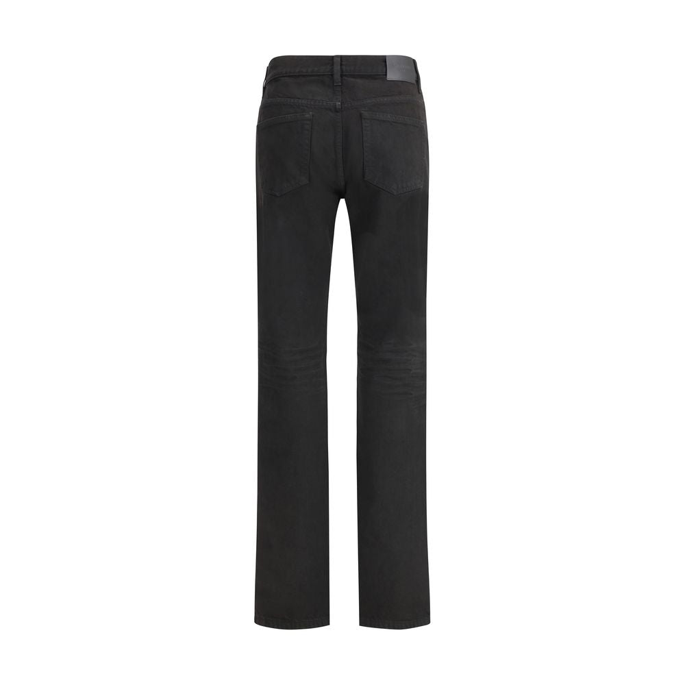 Black Cotton Straight-Leg JeansThe NICO jeans in Berlin denim reinterpret the classic five-pocket style with a modern, essential attitude. Crafted from certified cotton, they stand out for their low-rise waist and straight leg, offering an effortless yet