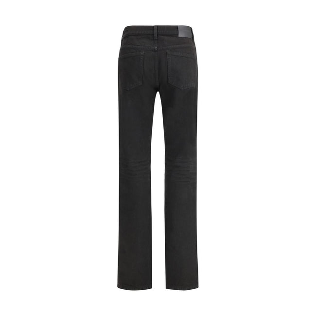 Black Cotton Straight-Leg JeansThe NICO jeans in Berlin denim reinterpret the classic five-pocket style with a modern, essential attitude. Crafted from certified cotton, they stand out for their low-rise waist and straight leg, offering an effortless yet