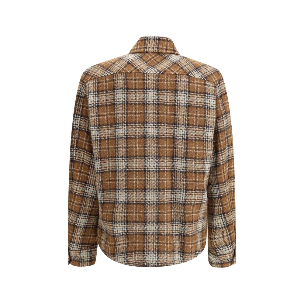 Brown Fleece Wool Jackets And CoatThe checked wool Overshirt by Monlcer captures the spirit of outdoor leisure. Crafted from soft checked wool, it balances practicality and style with its buttoned collar, zip closure, chest pocket with zip and snap button