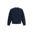 Blue Cotton SweatshirtThe Crew neck Sweatshirt by Stone Island is crafted from brushed organic cotton, offering a soft feel and a sustainable approach. Its design features raglan sleeves, overlock seams, and stretch ribbed finishes at cuffs and straight h