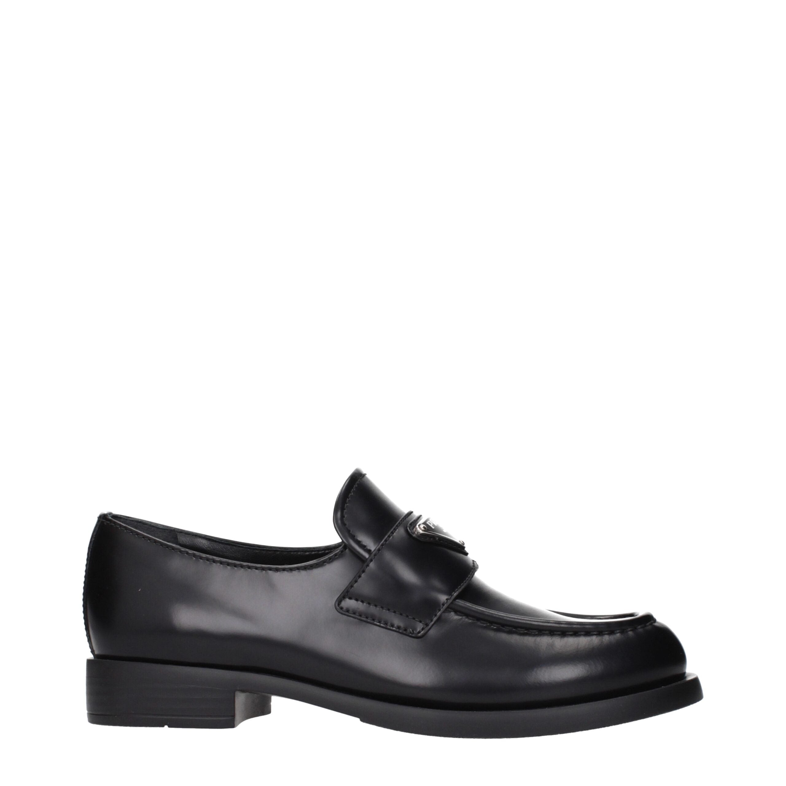 Black Leather Slip-On LoafersDescription: The product with MPN 1D329N055025F0002 and code F84289 leather in black is a loafers designed by Prada. It has features like front logo.Black Leather Slip-On Loafers${tagsPradaAulae Black Leather Slip-On Loafers P
