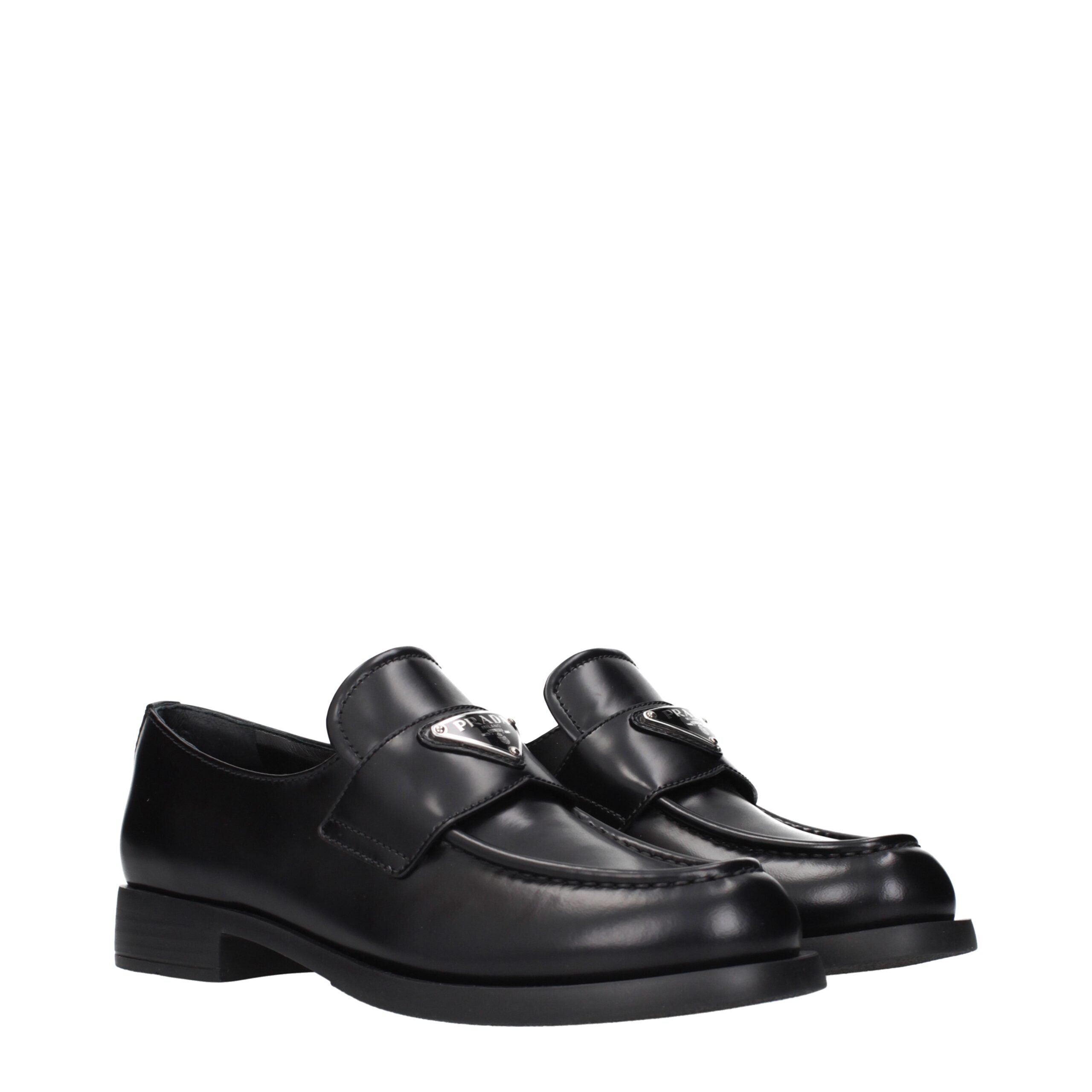 Black Leather Slip-On LoafersDescription: The product with MPN 1D329N055025F0002 and code F84289 leather in black is a loafers designed by Prada. It has features like front logo.Black Leather Slip-On Loafers${tagsPradaAulae Black Leather Slip-On Loafers P