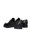 Black Leather Slip-On LoafersDescription: The product with MPN 1D329N055025F0002 and code F84289 leather in black is a loafers designed by Prada. It has features like front logo.Black Leather Slip-On Loafers${tagsPradaAulae Black Leather Slip-On Loafers P