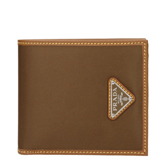Brown Fabric WalletDescription: The product with MPN 2MO5132CX201F0594 and code F84481 fabric in brown is a wallets designed by Prada. It has features like front logo.Brown Fabric Wallet${tagsPradaAulae Brown Fabric Wallets PradaAulae Brown Fabric Wallets