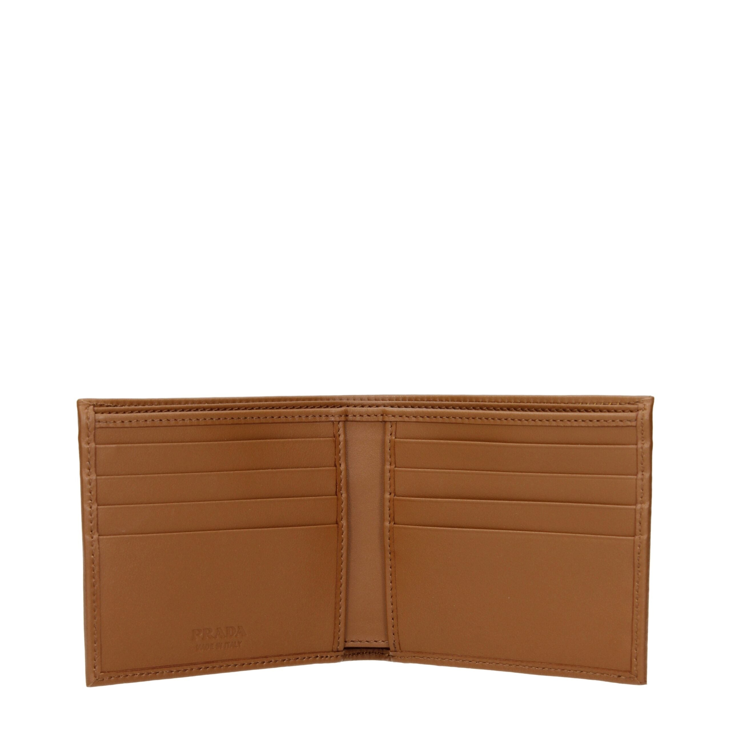 Brown Fabric WalletDescription: The product with MPN 2MO5132CX201F0594 and code F84481 fabric in brown is a wallets designed by Prada. It has features like front logo.Brown Fabric Wallet${tagsPradaAulae Brown Fabric Wallets PradaAulae Brown Fabric Wallets