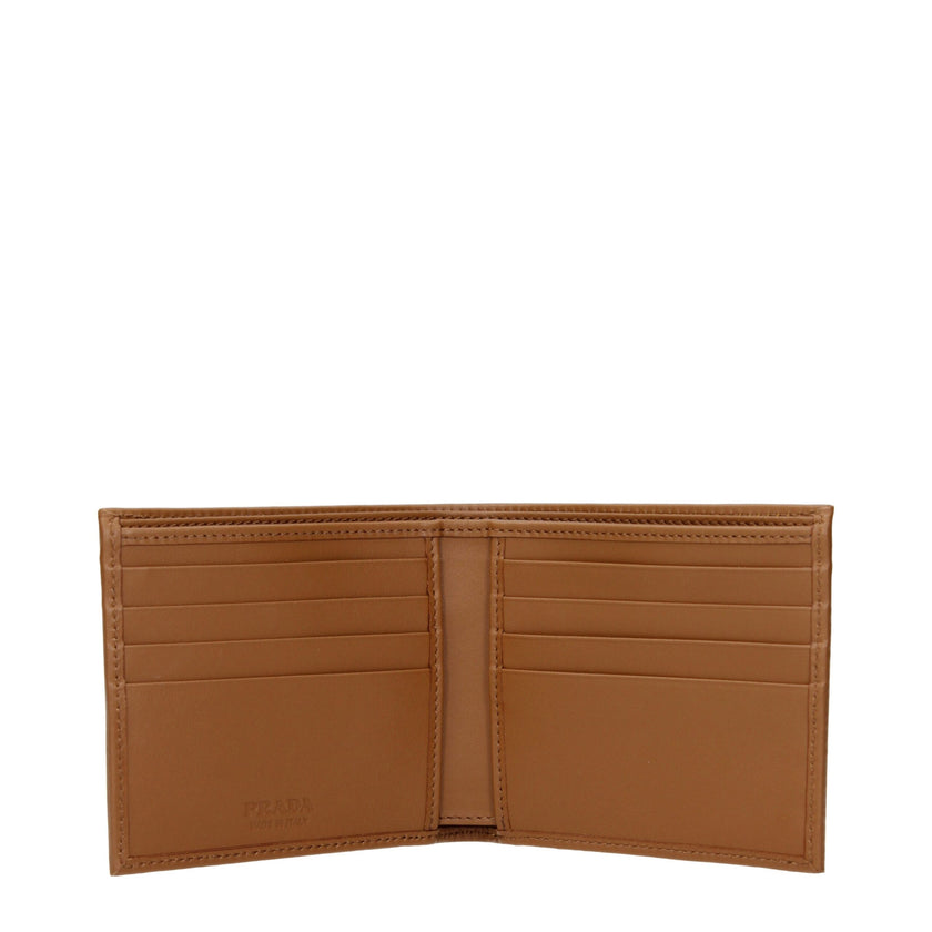Brown Fabric WalletDescription: The product with MPN 2MO5132CX201F0594 and code F84481 fabric in brown is a wallets designed by Prada. It has features like front logo.Brown Fabric Wallet${tagsPradaAulae Brown Fabric Wallets PradaAulae Brown Fabric Wallets