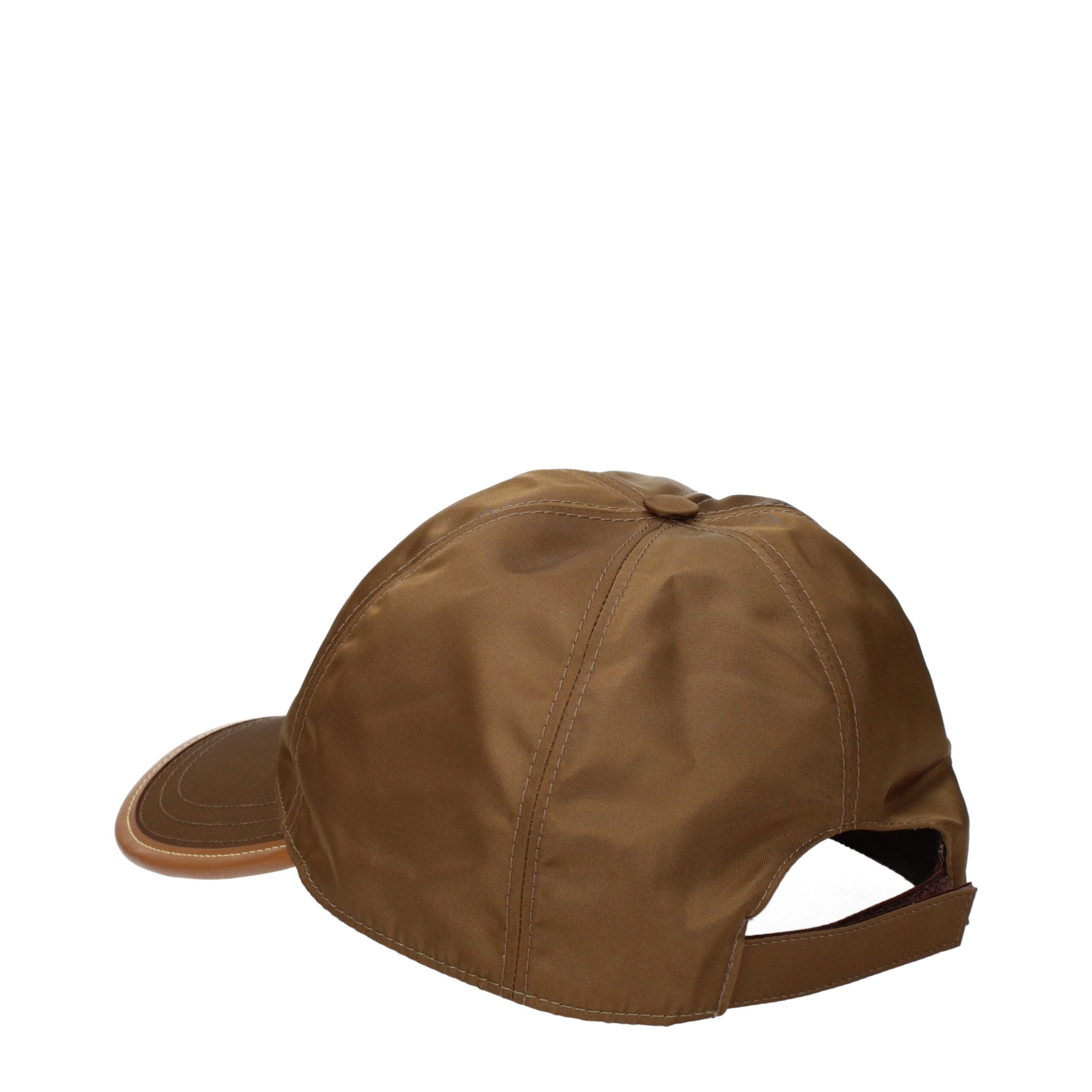 Brown Polyamide Cap (Baseball Hat)Description: The product with MPN 2HC2742CX201F0594 and code F84489 polyamide in brown is a hats designed by Prada. It has features like side logo.Brown Polyamide Cap (Baseball Hat)${tagsPradaAulae Brown Polyamide Caps (B