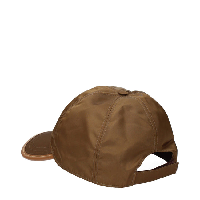 Brown Polyamide Cap (Baseball Hat)Description: The product with MPN 2HC2742CX201F0594 and code F84489 polyamide in brown is a hats designed by Prada. It has features like side logo.Brown Polyamide Cap (Baseball Hat)${tagsPradaAulae Brown Polyamide Caps (B