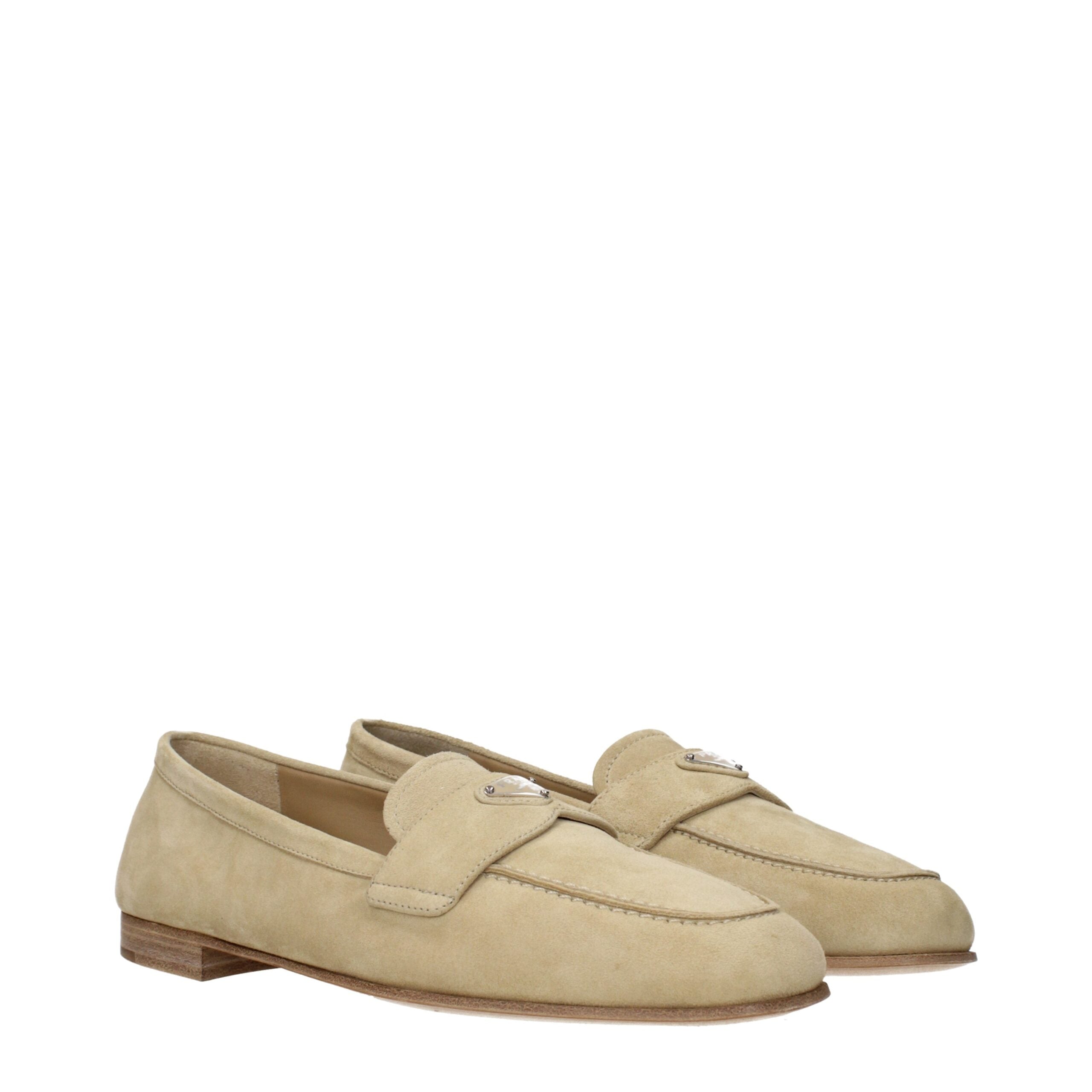 Beige Leather Slip-On LoafersDescription: The product with MPN 1D468N103010F0379 and code F84701 suede in beige is a loafers designed by Prada. It has features like front logo.Beige Leather Slip-On Loafers${tagsPradaAulae Beige Leather Slip-On Loafers Pra