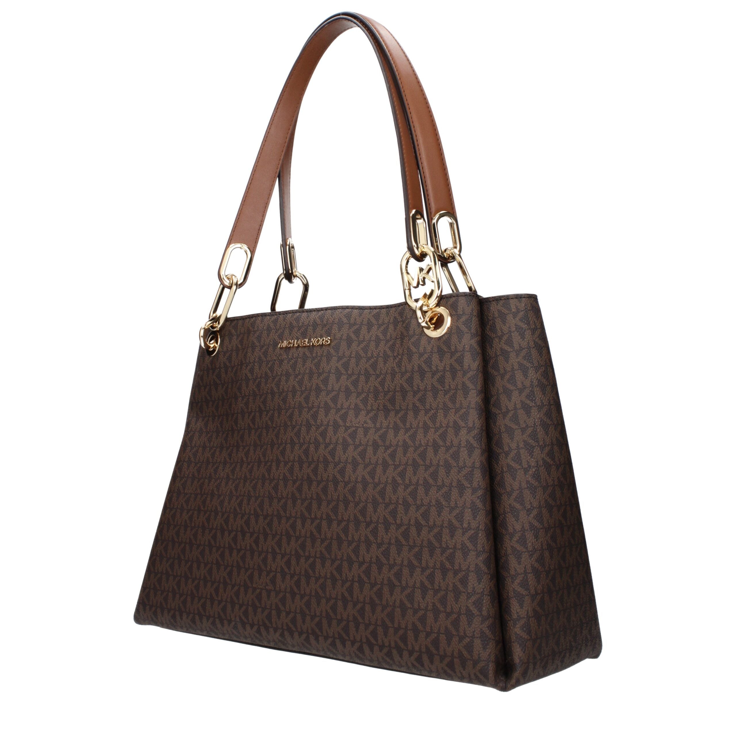 Brown Fabric Shoulder BagsDescription: The product with MPN 35H1G9TL9BBROWN and code F85057 fabric in brown is a shoulder bags designed by Michael Kors. It has features like logo.Brown Fabric Shoulder Bags${tagsMichael KorsAulae Brown Fabric Shoulder Bags