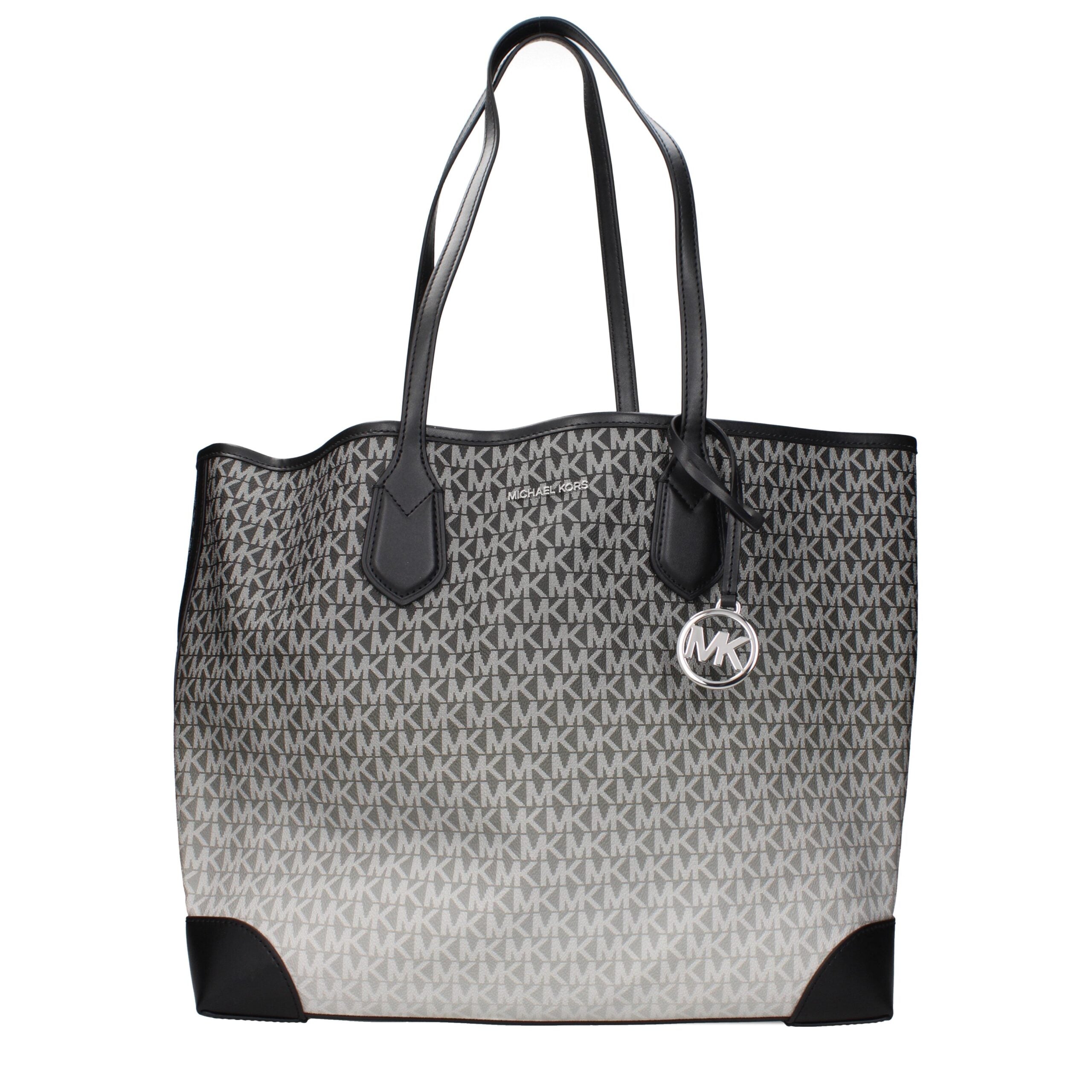 Black Fabric Shoulder BagDescription: The product with MPN 35R5SV0T7BBLACK and code F85025 fabric in black is a shoulder bags designed by Michael Kors. It has features like logo, front detail, removable details, removable inner clutch.Black Fabric Shoulde