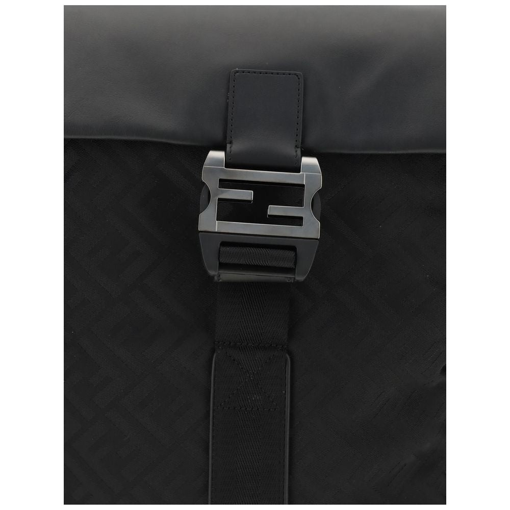 Black Nylon Shoulder BagNylon Flux Backpack by Fendi has a bold, contemporary style, embellished with all-over FF embroidery and a front metal FF logo buckle. Made of nylon with smooth calfskin inserts, it features a tonal leather handle, adjustable fabri