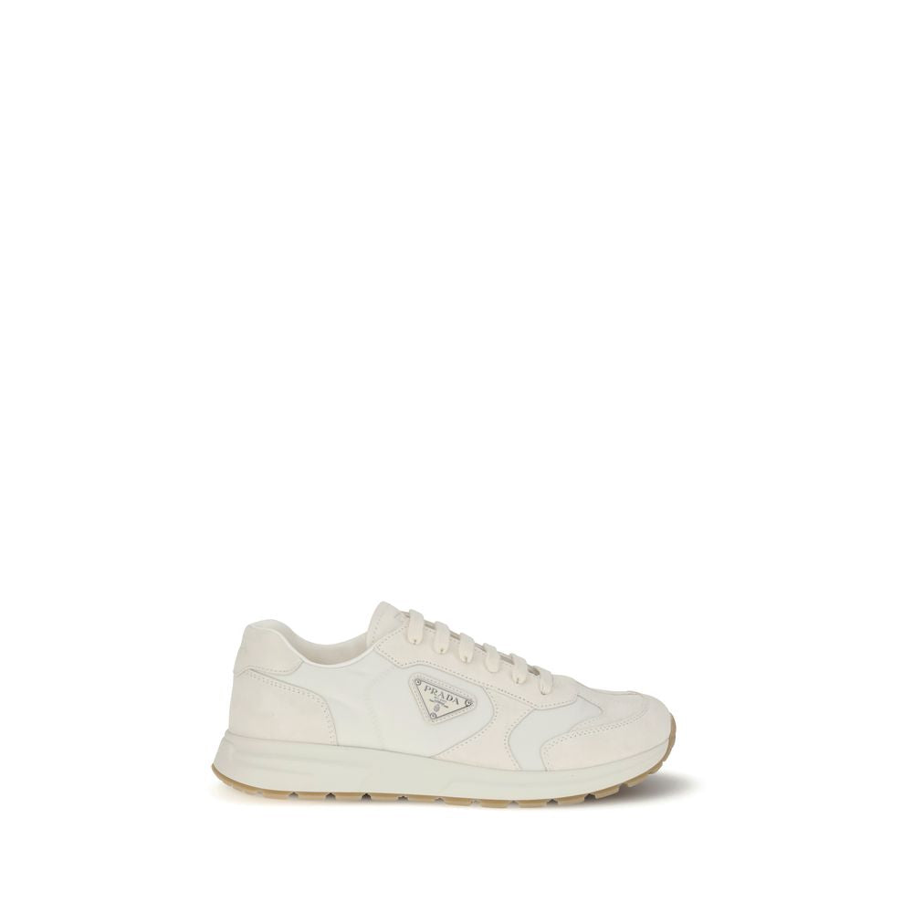 Cream Recycled Polyamide Athletic SneakersPrax 01 re-nylon Sneakers by Prada blend contemporary aesthetics and innovative materials. The upper with nylon lace loops lends a technical, modern look, enhanced by the enameled metal triangle logo and screen-pr