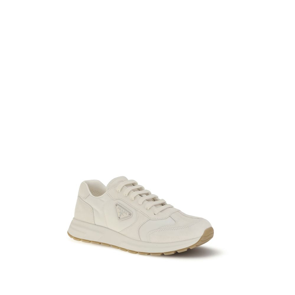 Cream Recycled Polyamide Athletic SneakersPrax 01 re-nylon Sneakers by Prada blend contemporary aesthetics and innovative materials. The upper with nylon lace loops lends a technical, modern look, enhanced by the enameled metal triangle logo and screen-pr