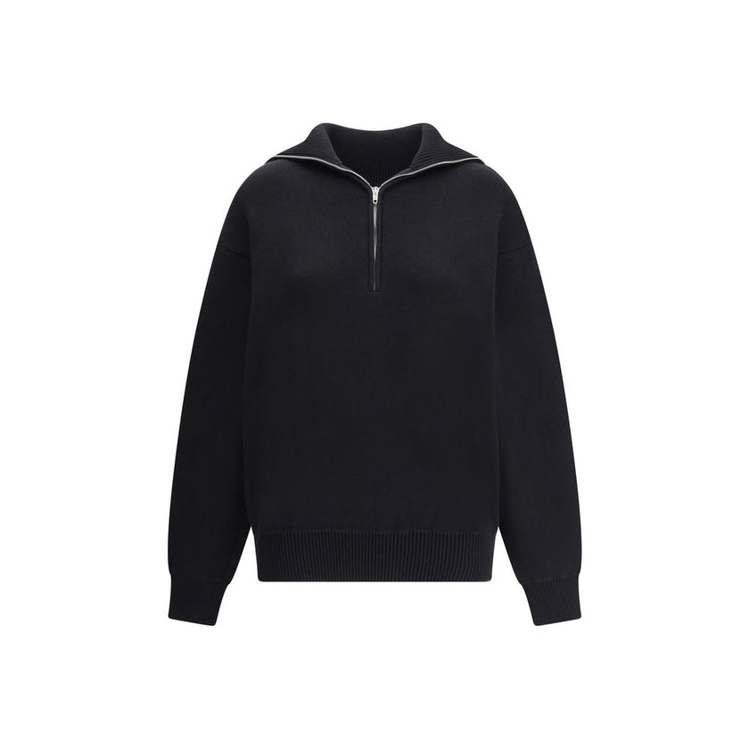 Black Cotton SweatshirtThe Back-to-Front Sweater by Balenciaga, crafted from heavy Cotton, features a distinctive design with a turned-up turtleneck and half zip at the back. Completed with practical pockets, long cuffed sleeves, and dropped shoulders, it
