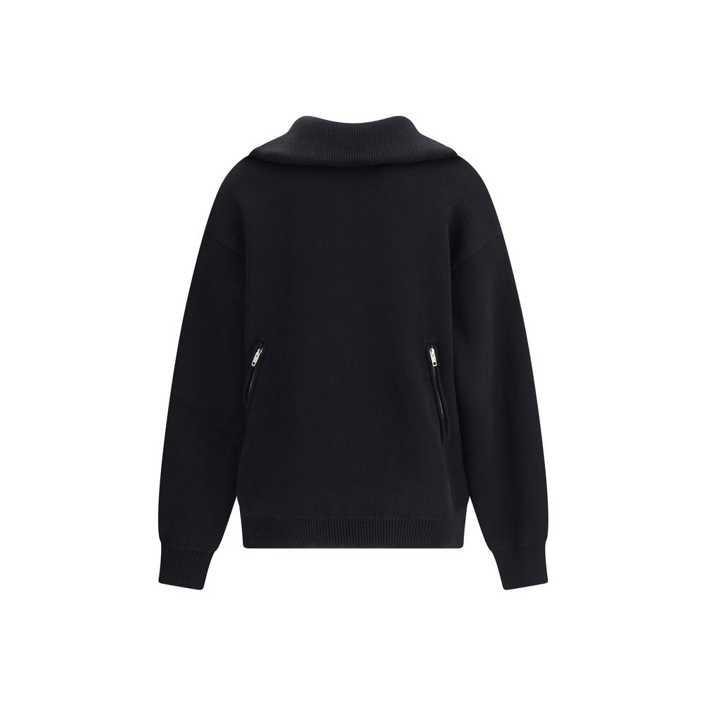 Black Cotton SweatshirtThe Back-to-Front Sweater by Balenciaga, crafted from heavy Cotton, features a distinctive design with a turned-up turtleneck and half zip at the back. Completed with practical pockets, long cuffed sleeves, and dropped shoulders, it