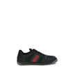 Black Calf Leather Bos Taurus SneakersScreener Sneakers by Gucci are made of leather, with a round toe for comfort and a lace-up front closure for a customized fit. The side panels are embellished with the iconic colored webbing bands, a distinctive detai