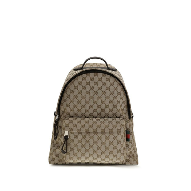 Beige Nylon BackpackThe GG Fabric Backpack by Gucci, from the Spring Summer 2025 Collection, combines craftsmanship and functionality in an elegant design. Crafted in beige and dark brown GG fabric with leather trims and a cotton-linen lining, it features