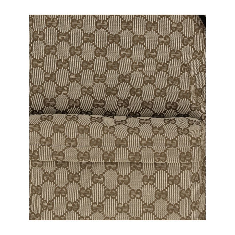 Beige Nylon BackpackThe GG Fabric Backpack by Gucci, from the Spring Summer 2025 Collection, combines craftsmanship and functionality in an elegant design. Crafted in beige and dark brown GG fabric with leather trims and a cotton-linen lining, it features