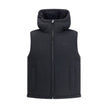 Black Wool Sleveless JacketThe Reversible Bouclé Wool Gilet by Gucci fuses practicality with contemporary elegance. One side showcases the rich texture of black bouclé wool, while the other reveals nylon detailed with the iconic GG motif, offering two dis