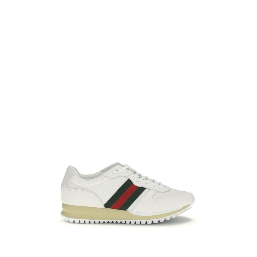 White Polyamide Athletic SneakersThe Nora Sneakers by Gucci combine sporty heritage and contemporary style. Crafted from black Original GG canvas with suede trim and GG nylon inserts, they feature the iconic green and red Web stripe on the sides. The rubb