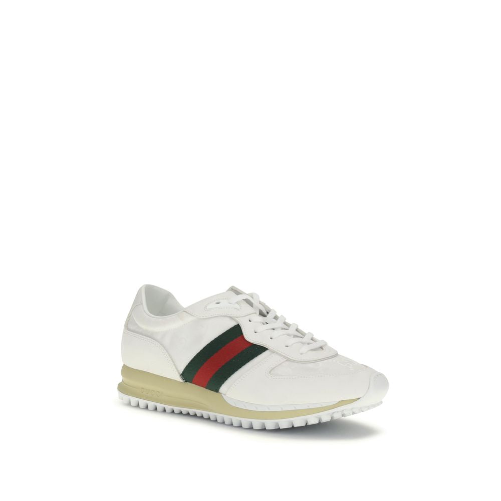 White Polyamide Athletic SneakersThe Nora Sneakers by Gucci combine sporty heritage and contemporary style. Crafted from black Original GG canvas with suede trim and GG nylon inserts, they feature the iconic green and red Web stripe on the sides. The rubb