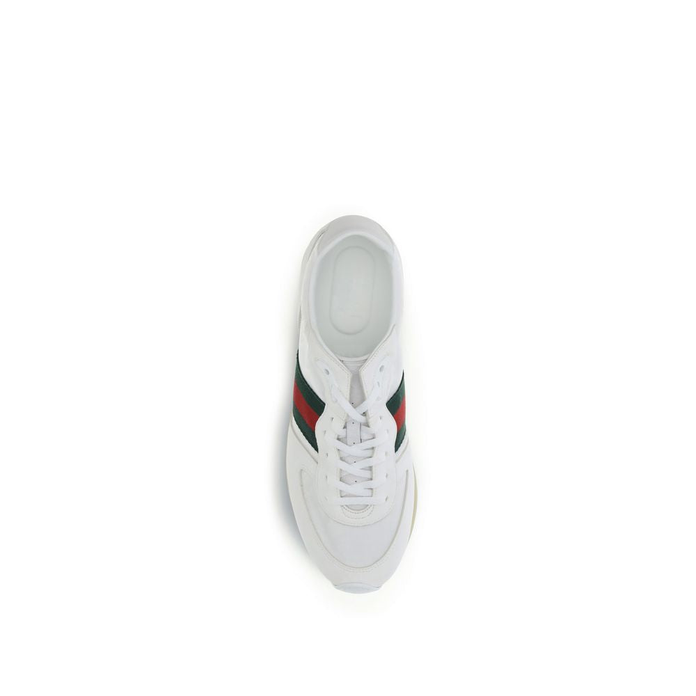 White Polyamide Athletic SneakersThe Nora Sneakers by Gucci combine sporty heritage and contemporary style. Crafted from black Original GG canvas with suede trim and GG nylon inserts, they feature the iconic green and red Web stripe on the sides. The rubb
