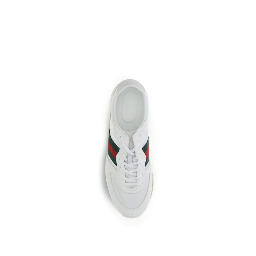 White Polyamide Athletic SneakersThe Nora Sneakers by Gucci combine sporty heritage and contemporary style. Crafted from black Original GG canvas with suede trim and GG nylon inserts, they feature the iconic green and red Web stripe on the sides. The rubb