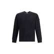 Logoed SweatshirtCotton Sweatshirt by Stone Island featuring a ribbed crew neck, a logo patch applied to the left sleeve and ribbed details on the cuffs and hem. The plush interior provides comfort and warmth, making this garment perfect for cooler days.