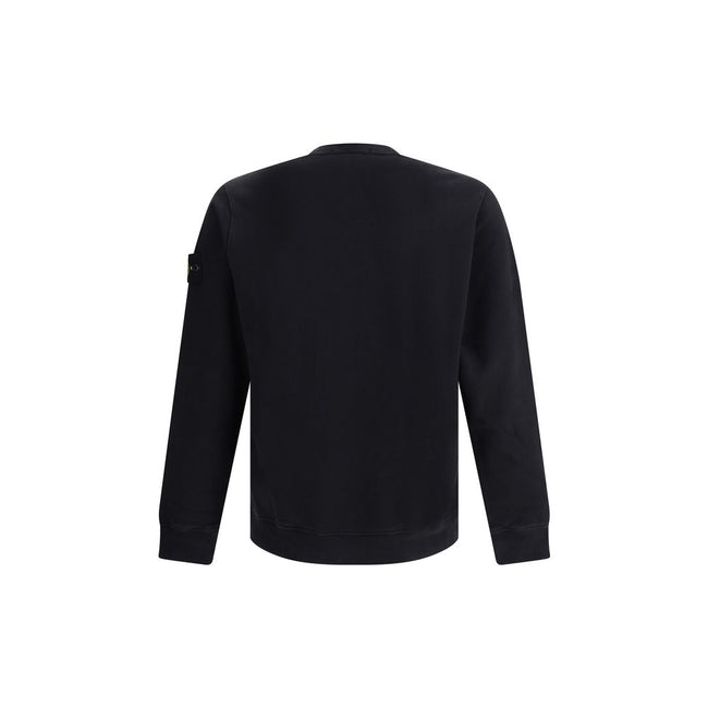 Logoed SweatshirtCotton Sweatshirt by Stone Island featuring a ribbed crew neck, a logo patch applied to the left sleeve and ribbed details on the cuffs and hem. The plush interior provides comfort and warmth, making this garment perfect for cooler days.