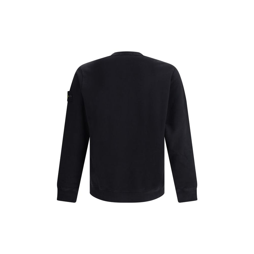 Logoed SweatshirtCotton Sweatshirt by Stone Island featuring a ribbed crew neck, a logo patch applied to the left sleeve and ribbed details on the cuffs and hem. The plush interior provides comfort and warmth, making this garment perfect for cooler days.