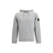 Gray Cotton SweatshirtThe Hoodie by Stone Island combines functionality and iconic style. Featuring an adjustable drawstring hood, it has a regular fit and two practical side welt pockets. The ribbed cuffs and straight hem ensure comfort and a snug fit, w