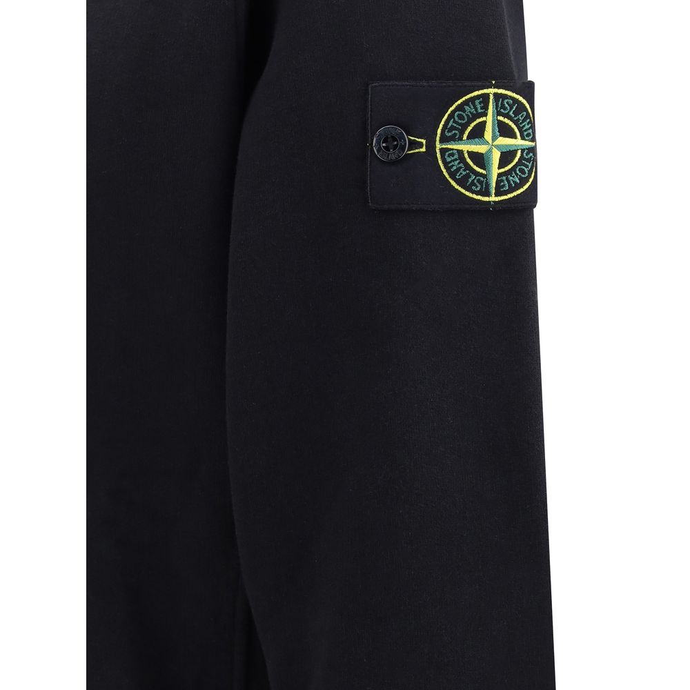 Logoed SweatshirtCotton Sweatshirt by Stone Island featuring a ribbed crew neck, a logo patch applied to the left sleeve and ribbed details on the cuffs and hem. The plush interior provides comfort and warmth, making this garment perfect for cooler days.