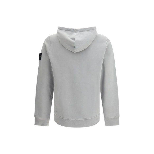 Gray Cotton SweatshirtThe Hoodie by Stone Island combines functionality and iconic style. Featuring an adjustable drawstring hood, it has a regular fit and two practical side welt pockets. The ribbed cuffs and straight hem ensure comfort and a snug fit, w