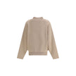 Beige Wool SweatshirtThis relaxed-fit Polo Sweater is crafted from heavy virgin Wool and Cashmere, perfect for colder days. Featuring a wide turtleneck, ribbed collar, cuffs and hem, and a yoke panel, it is finished with a red embroidered ‘J’ on the colla