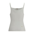 White Cotton TopThe Cotton Tank Top by Chloé channels feminine elegance through fluid and refined lines. Its lightweight silhouette is enhanced by tailored finishes and a golden medal detail on the side, a signature touch of the maison. With its essential