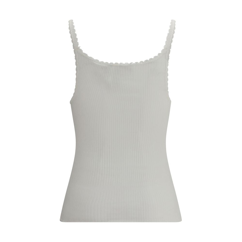 White Cotton TopThe Cotton Tank Top by Chloé channels feminine elegance through fluid and refined lines. Its lightweight silhouette is enhanced by tailored finishes and a golden medal detail on the side, a signature touch of the maison. With its essential