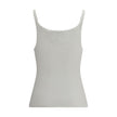 White Cotton TopThe Cotton Tank Top by Chloé channels feminine elegance through fluid and refined lines. Its lightweight silhouette is enhanced by tailored finishes and a golden medal detail on the side, a signature touch of the maison. With its essential