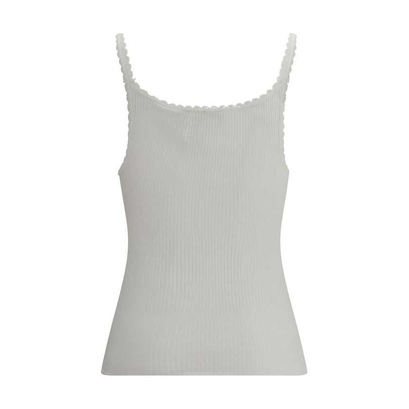 White Cotton TopThe Cotton Tank Top by Chloé channels feminine elegance through fluid and refined lines. Its lightweight silhouette is enhanced by tailored finishes and a golden medal detail on the side, a signature touch of the maison. With its essential