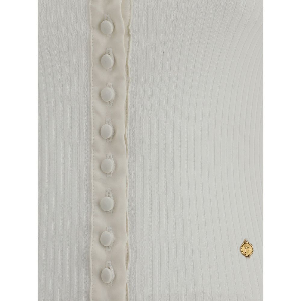 White Cotton CardiganThe Cotton Cardigan by Chloé embodies essential and timeless elegance. Featuring a round neckline, front button fastening and long sleeves, it stands out with its clean lines, straight hem and tonal stitching. A lightweight and refine