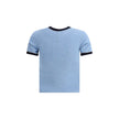 Printed logo T-shirtThe light blue cotton T-shirt blends essential lines with distinctive details. A ribbed crewneck and short sleeves finished with contrasting black edges give the piece a modern, graphic appeal. The printed Chloé logo on the chest adds
