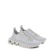 White Nylon Athletic SneakersDescription: – Composition: 100% Nylon – Inner: 100% Leather – Insole: 100% Leather – Sole: 100% Rubber – pull tab at the rear – Round toe – Embossed logo detail – Slip-on design – Lace detail – Knitted upper – Made in Italy –