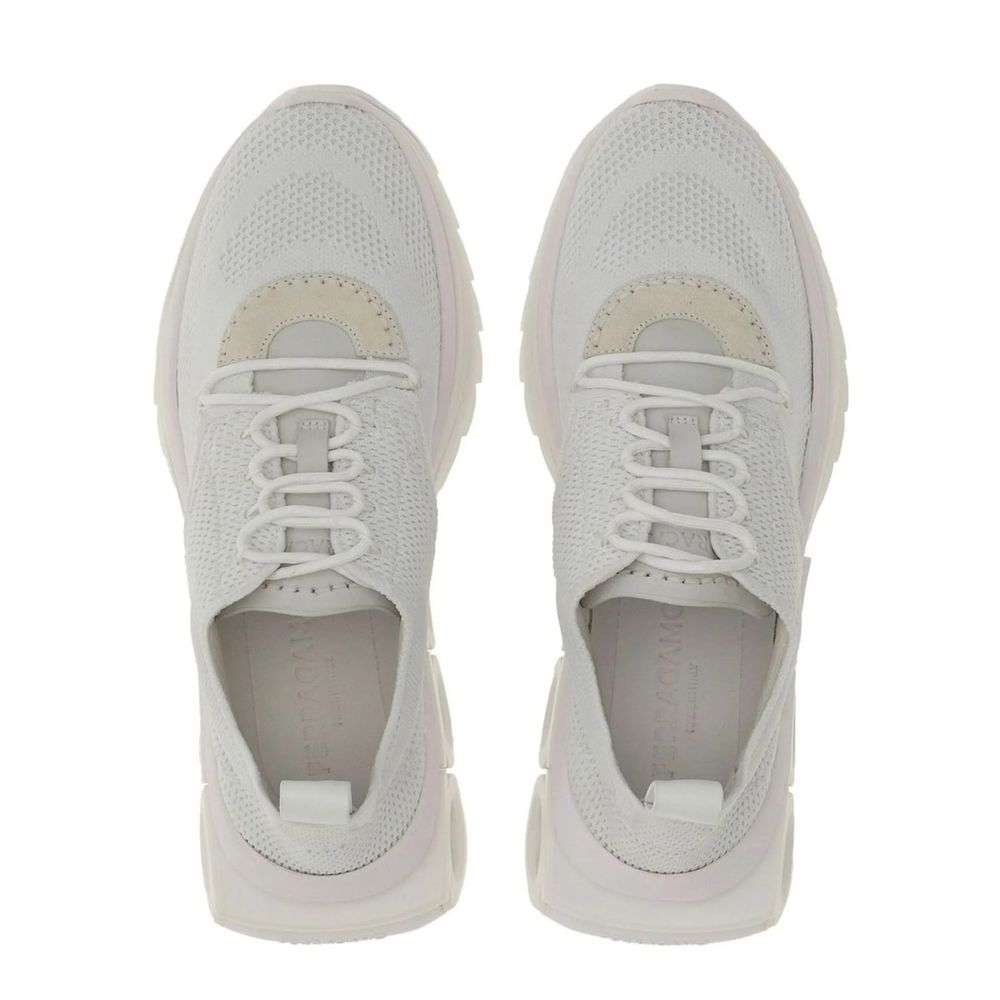 White Nylon Athletic SneakersDescription: – Composition: 100% Nylon – Inner: 100% Leather – Insole: 100% Leather – Sole: 100% Rubber – pull tab at the rear – Round toe – Embossed logo detail – Slip-on design – Lace detail – Knitted upper – Made in Italy –