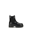 Black Rubber Ankle BootsThe brushed leather Ankle Boots by Prada combine sophistication with bold character. The upper features elasticated side inserts and a rear pull tab, while the leather lining ensures comfort and artisanal quality. The iconic enamel