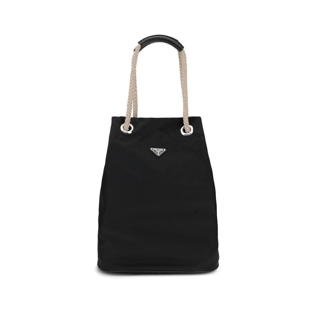 Black Recycled Polyamide Shoulder BagMedium Mariner Re-Nylon Bucket Bag by Prada combines functional design and sustainable materials. The soft, roomy silhouette is enhanced by rope and leather sliding handles that contrast with the technical texture of R