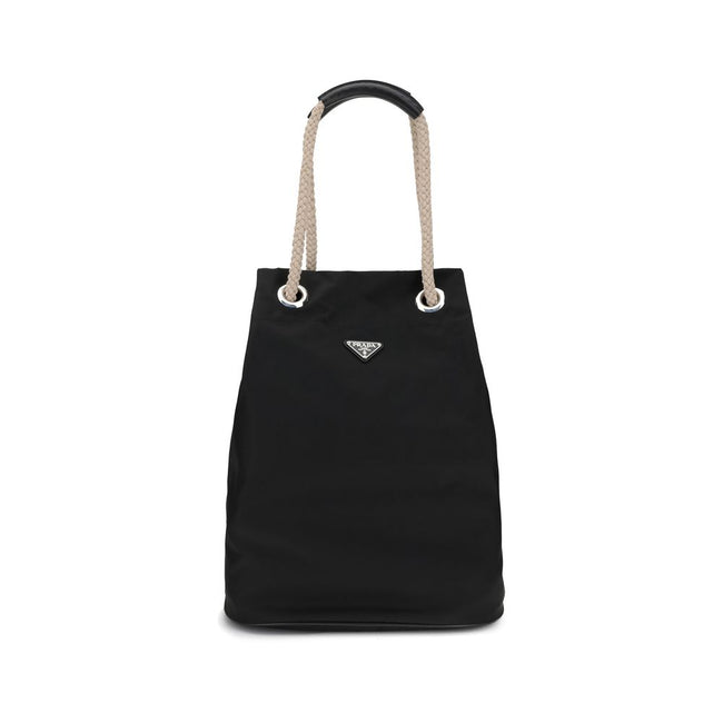 Black Recycled Polyamide Shoulder BagMedium Mariner Re-Nylon Bucket Bag by Prada combines functional design and sustainable materials. The soft, roomy silhouette is enhanced by rope and leather sliding handles that contrast with the technical texture of R